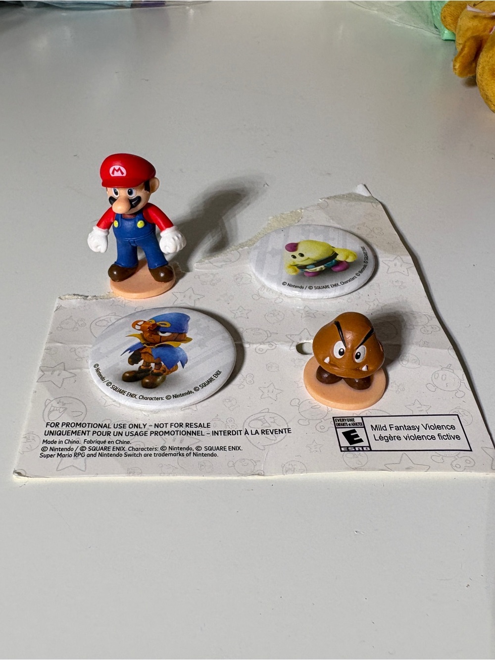Nintendo button and figures
